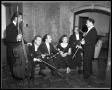 Photograph: Men and Woman with Instruments #2