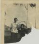 Photograph: [Photograph of Woman on Tree Swing]