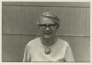 Primary view of object titled '[Photograph of Woman Wearing a Brooch]'.