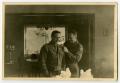 Photograph: [Photograph of Officer and Captain]