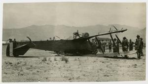 Primary view of object titled '[Overturned Biplane]'.