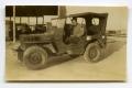 Photograph: [Photograph of Soldier in Jeep]
