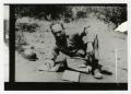 Photograph: [Photograph of Soldier Writing]