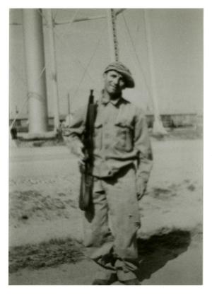 Primary view of object titled '[Photograph of Soldier with Rifle]'.