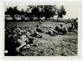 Photograph: [Photograph of Soldiers Eating in Field]