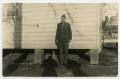 Photograph: [Photograph of Soldier Outside Barracks]