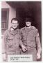Thumbnail image of item number 1 in: '[Jack Nickoli and Charles Staples Standing Near Doorway]'.