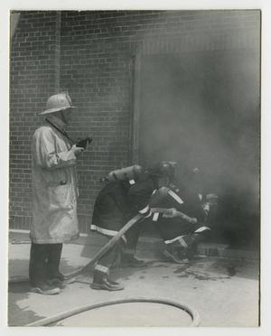 Primary view of object titled '[Firemen in Doorway]'.
