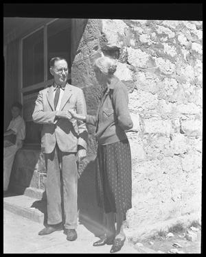 Primary view of object titled '[Mayor Mary Kyle Hartson and man standing at Fire Station]'.