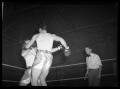 Photograph: [Two Boxers and Referee]