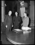 Photograph: [Governor W. Lee O'Daniel Standing with Two Men]
