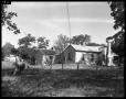 Photograph: [Back Exterior of Rural Home]