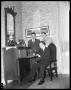 Photograph: [Governor W. Lee O'Daniel Signing Document]