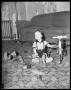Photograph: [Child with Toys]