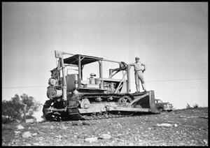 Primary view of object titled '[Man on tractor]'.