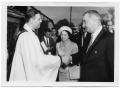 Photograph: [Lyndon and Lady Bird Johnson Meeting Priest]