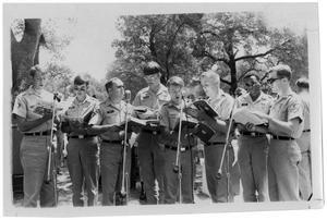 Primary view of object titled '[Uniformed Young Men Singing]'.