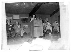 Primary view of object titled '[Lady Bird Johnson at a Podium]'.