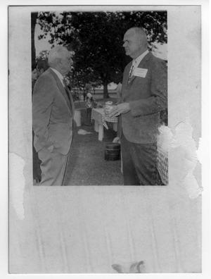 Primary view of object titled '[Two Men Outside]'.