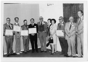 Primary view of object titled '[Lady Bird Johnson Standing with Award Winners]'.