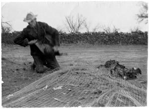 Primary view of object titled '[Man and Captured Turkeys]'.