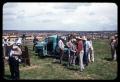 Thumbnail image of item number 1 in: '[Truck Near Cattle Pens with People Gathered Around]'.
