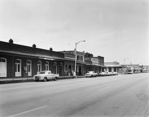 Primary view of object titled '[Calvert Commercial District, (West side looking North)]'.