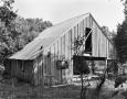 Photograph: [Gruenewald Log House, (Southwest oblique)]