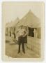 Photograph: [Man Near Back of Tents]