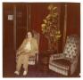 Photograph: [Photograph of Woman in Hotel Lobby]
