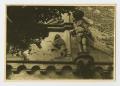 Photograph: [Photograph of Statues on Building]
