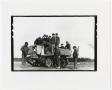 Primary view of [A Group of Soldiers Around a Tracked Motor Gun Carriage]