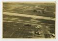 Photograph: [Photograph of Airplanes in Field]