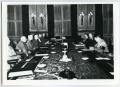 Photograph: [Adolf Hitler Sitting at a Conference Table]