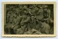Photograph: [A Large Group of Soldiers Sitting for a Picture]