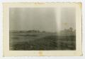 Photograph: [A Large Row of Parked Tanks]