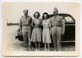 Photograph: [Photograph of Two Lieutenants and Two Ladies by an Automobile]