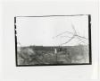 Photograph: [Photograph of a Damaged Building]