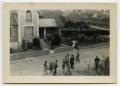 Photograph: [Photograph of People in Residential Street]