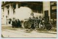Postcard: [Postcard with a Photograph of a Fire Engine by a Bank]