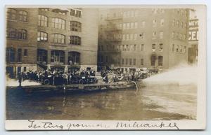 Primary view of object titled '[Postcard with a Photo of the Milwaukee Fire Department Testing Equipment]'.