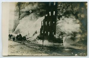 Primary view of object titled '[Postcard with a Photograph of a Large Building on Fire]'.