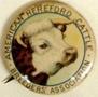 Physical Object: [Cream button with image of a head of cattle]