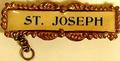 Thumbnail image of item number 1 in: '[A "St. Joseph" pin]'.