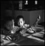 Primary view of [Two of Oliver Jacobs' Grandchildren at a Table]