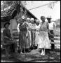 Photograph: [People Gathered at Ranch Cookshack]
