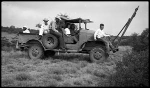 Primary view of object titled '[Ranchers Sitting on a Truck]'.