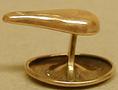 Thumbnail image of item number 1 in: '[One of a pair of copper cuff links in the shape of a teardrop]'.