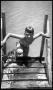 Thumbnail image of item number 1 in: '[Boy Climbing Out of Water]'.