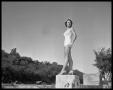 Primary view of [Woman posing in bathing suit and heels]